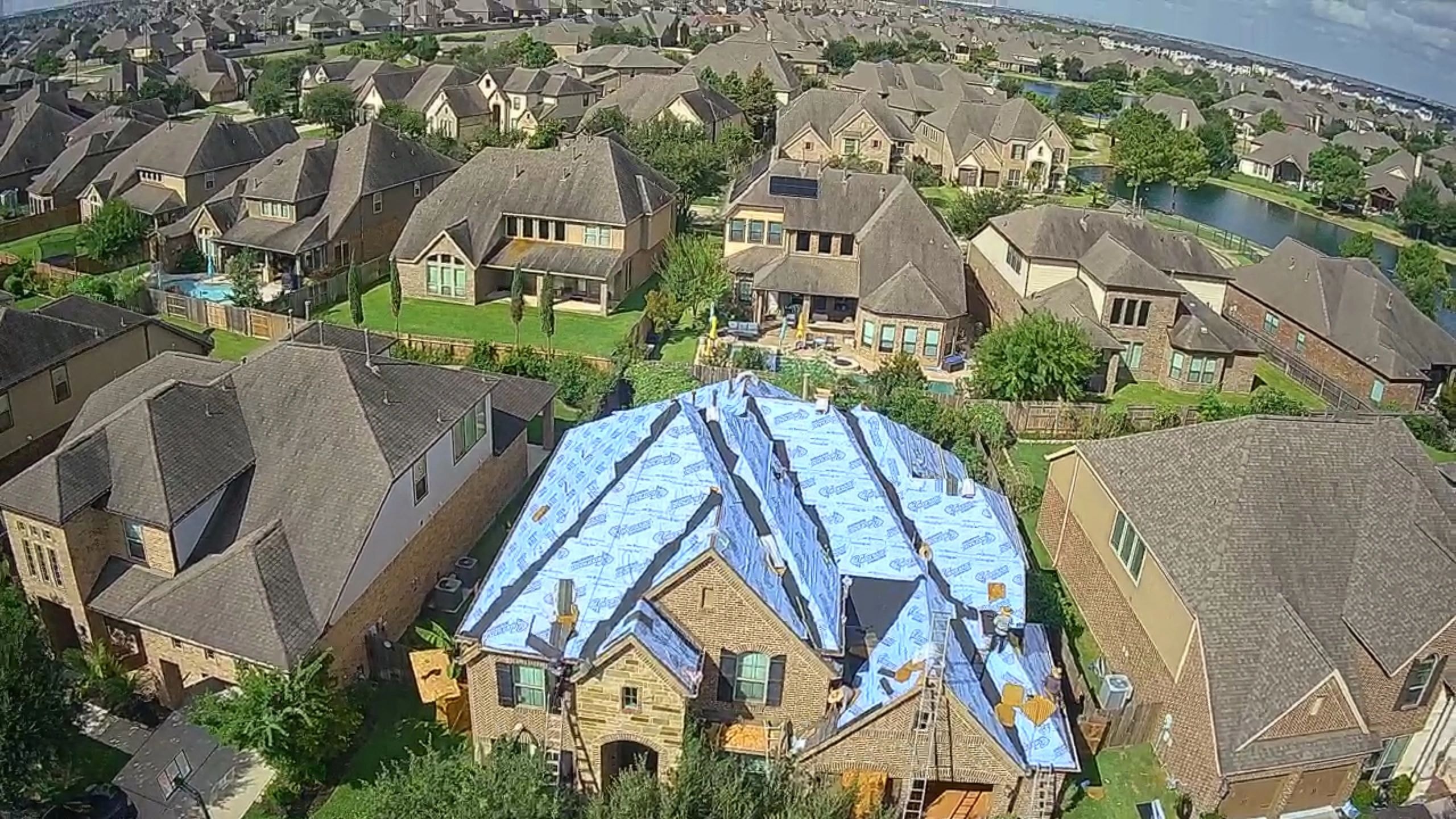 Roof underlayment installation in progress